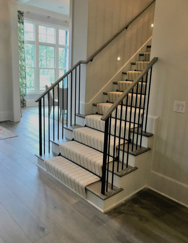 straight stairs for home with carpeted runner