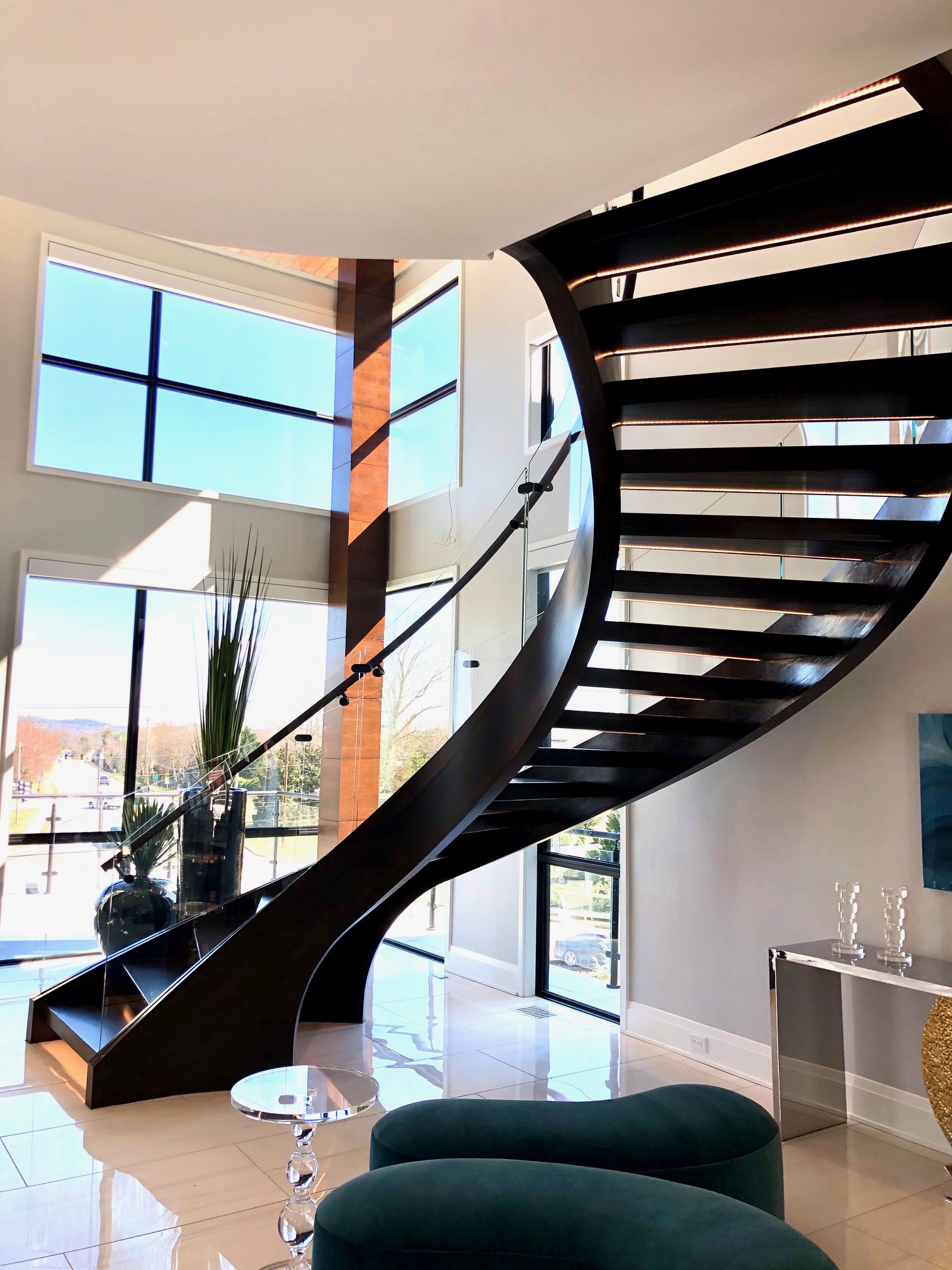 all black floating staircase with glass balustrade for modern staircases design
