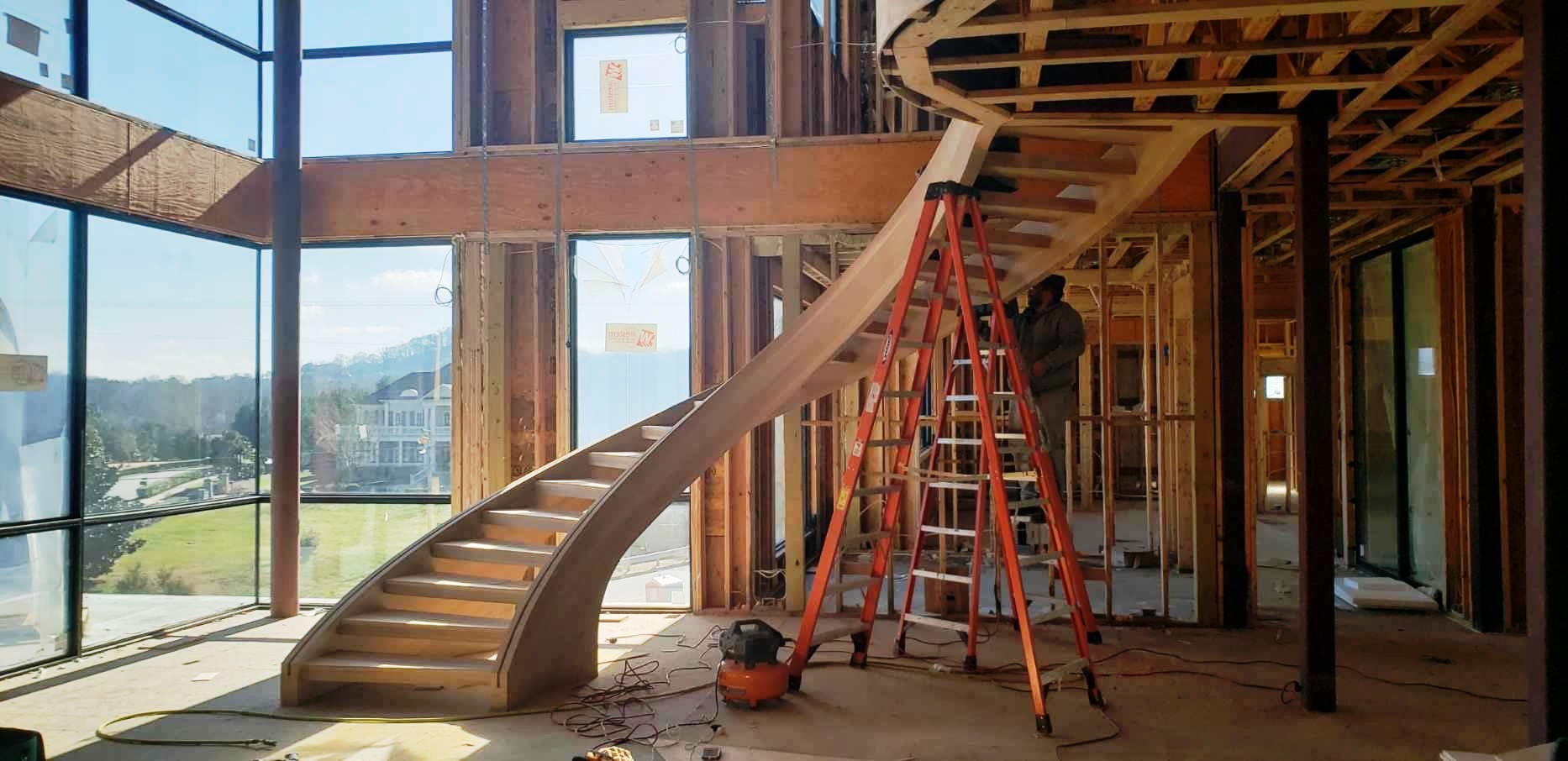 our construction process for floating curved stairway designs