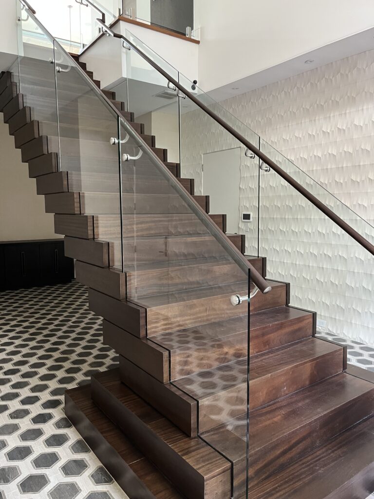 conversation starter floating staircases designs with a modern glass stair railing