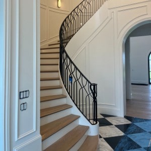 Enhancing Home Aesthetics with a Modern Curved Staircase