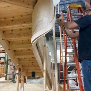 Elevate Your Space with a Bespoke Curved Staircase