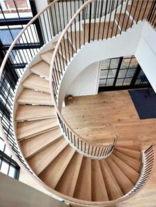 Floating, Curved White Oak Treads Custom-Designed Modern Farmhouse Staircase
