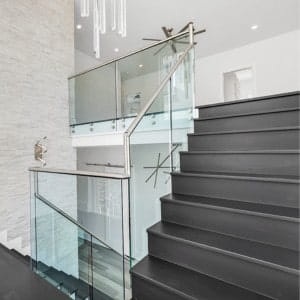 Glass Guardrail + Natural Wood Treads for Bright, Airy Southern Interiors