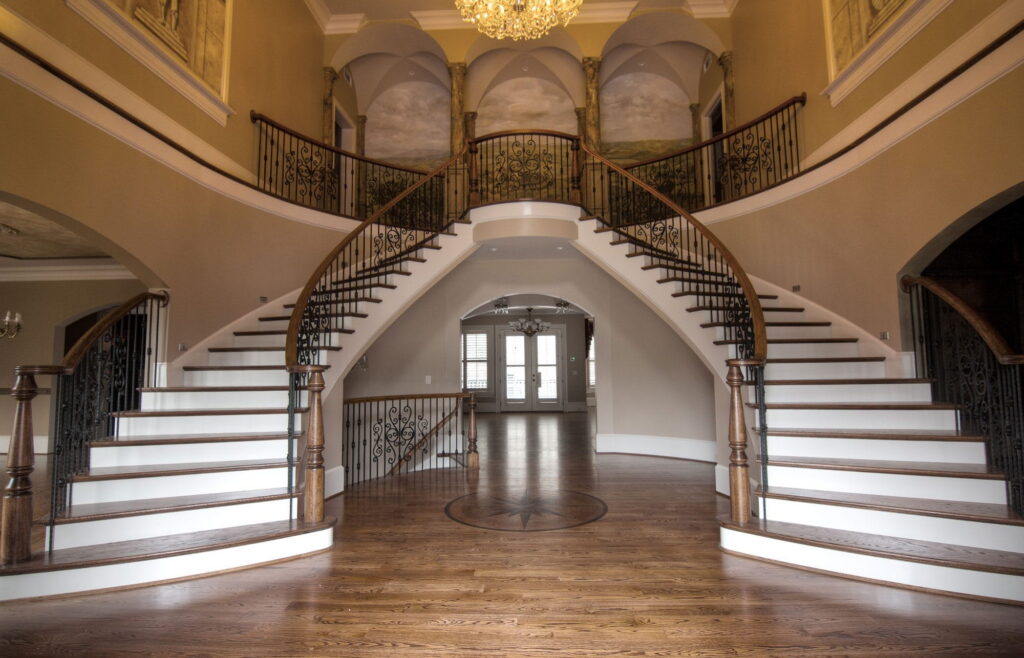 Pick the Right Custom Stair Builder for Nashville Luxury Grand Double Curved Staircase